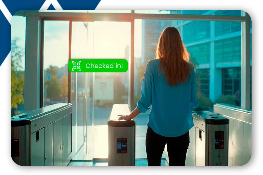 A woman passing through the access control turnstile at the reception of a business building and automatically being checked in.